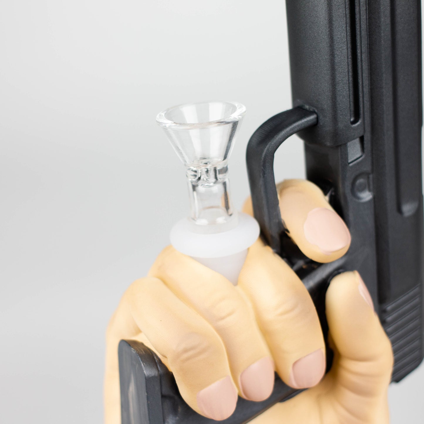 A bong with a pistol in hand_5